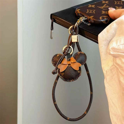 Luxury Monogram Case with Bow Charm & Wrist Lanyard 12-18 Pro & Pro Max